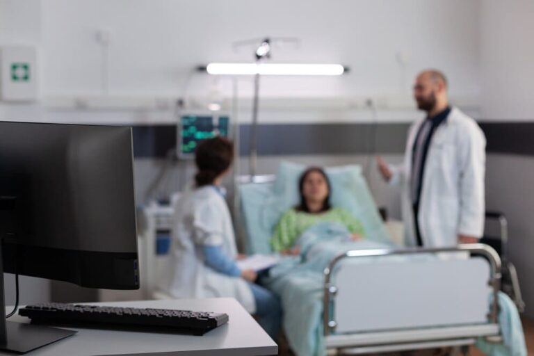 sick-patient-resting-bed-wearing-nasal-oxygen-tube-while-discussing-with-doctors-medical-treatmen_482257-2658-1